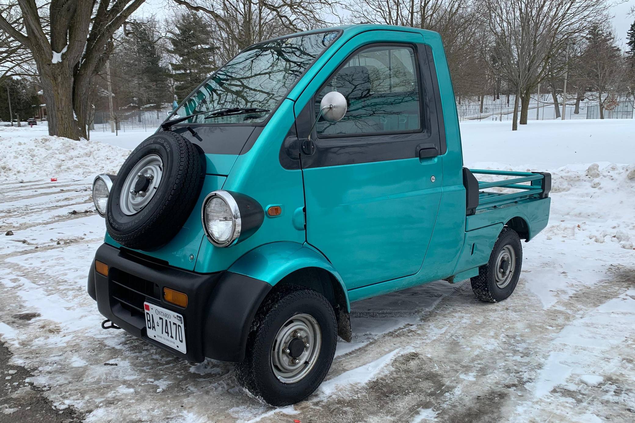 1996 Daihatsu Midget sold at auction for $5,800