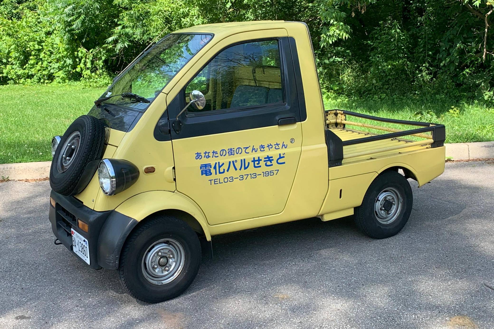 1997 Daihatsu Midget sold at auction for $3,983