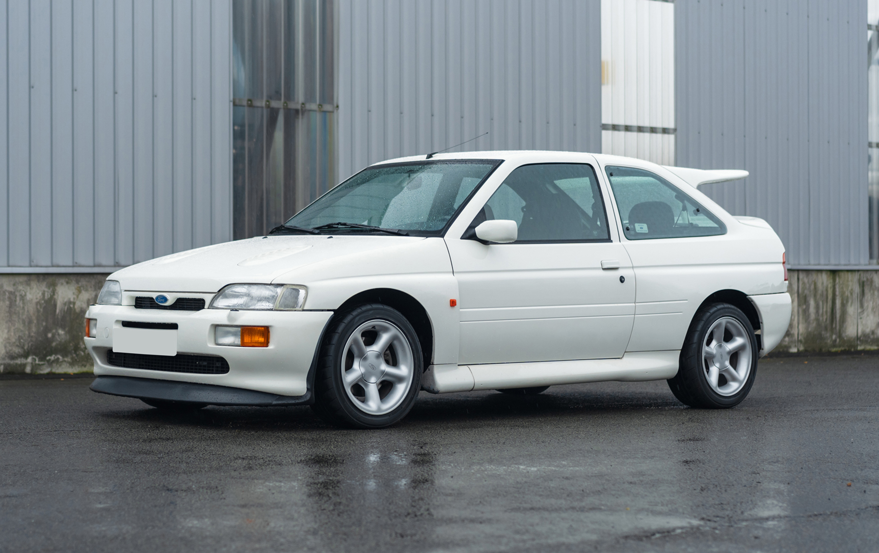 1995 Ford Escort sold at auction for $63,250