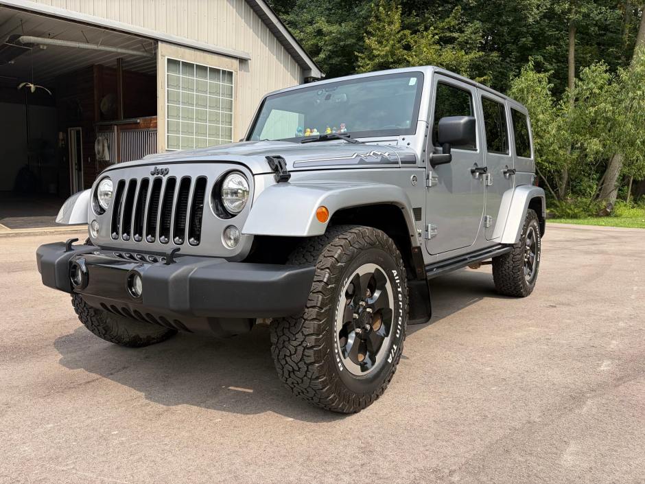 2014 Jeep Wrangler sold at auction for $12,250