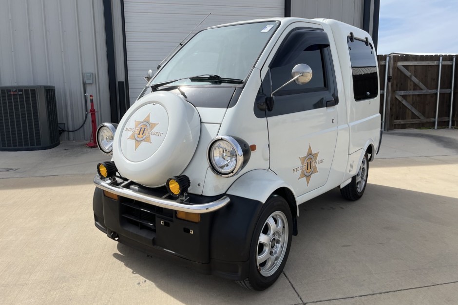 1998 Daihatsu Midget sold at auction for $7,500