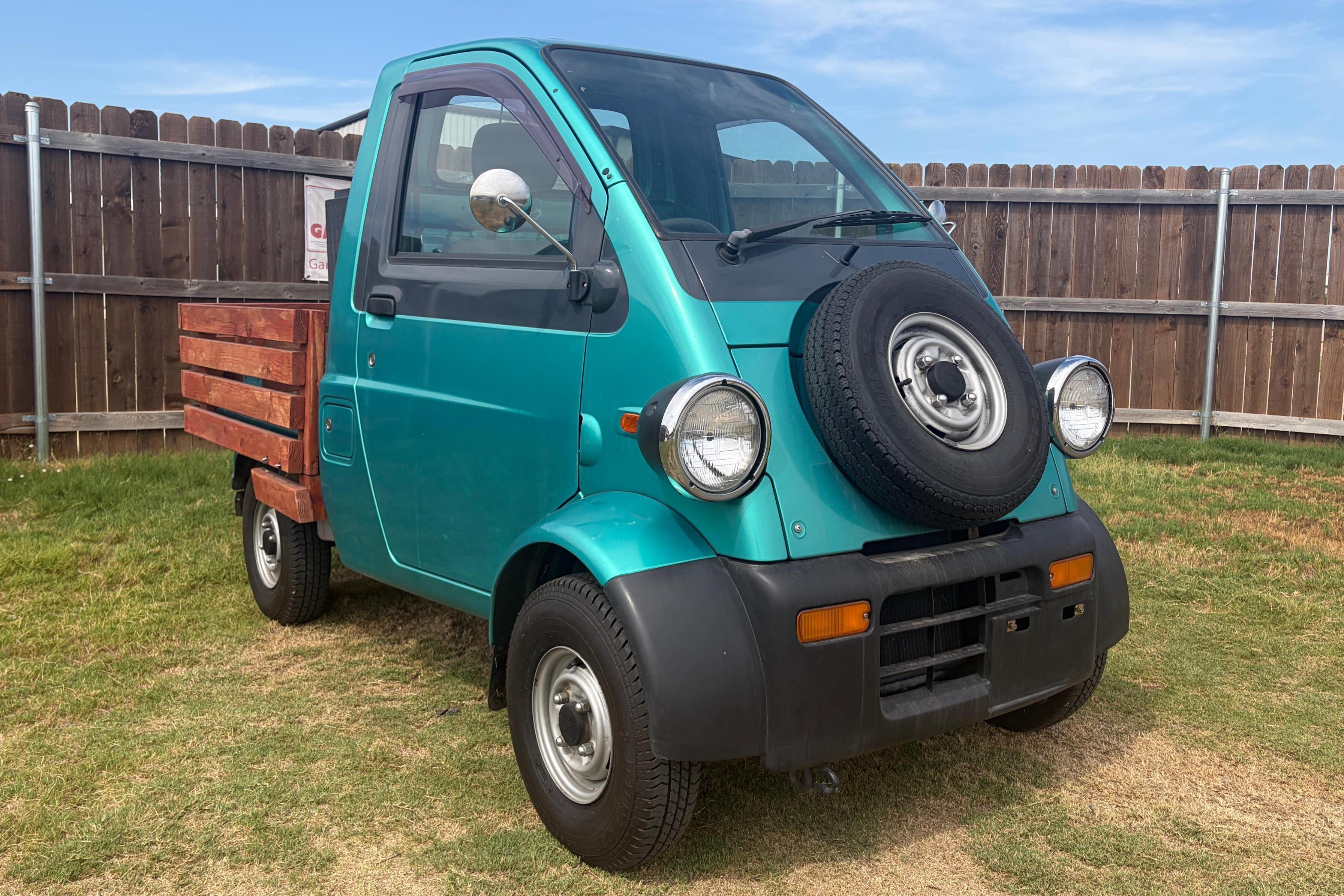 1996 Daihatsu Midget sold at auction for $6,100