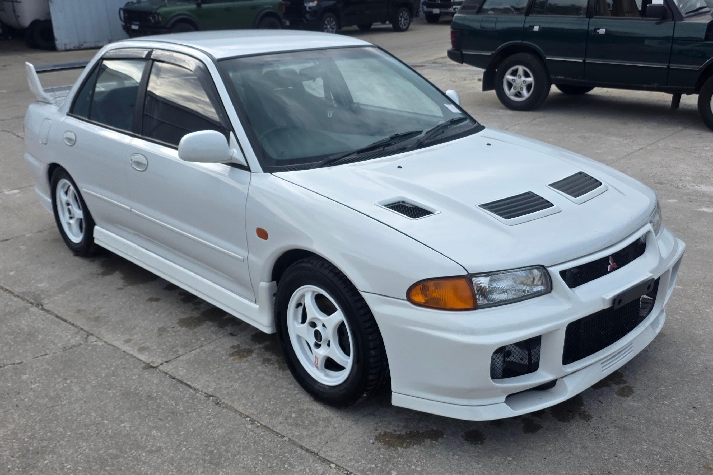 1995 Mitsubishi Lancer Evolution sold at auction for $18,000