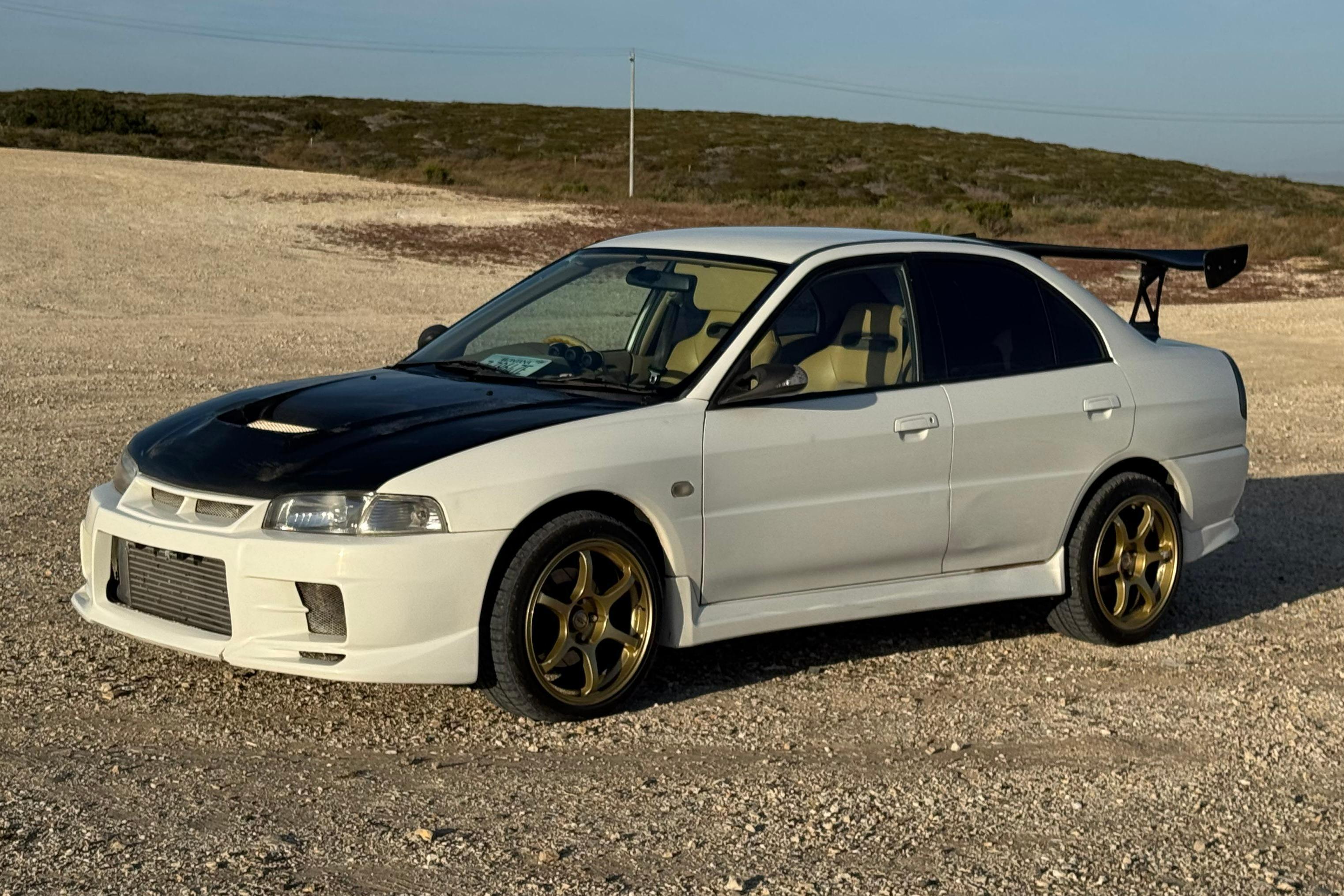 1996 Mitsubishi Lancer Evolution sold at auction for $11,600