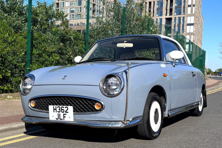1991 Nissan Figaro sold at auction for $13,750