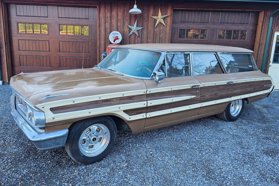 1964 Ford Country Squire sold at auction for $18,750