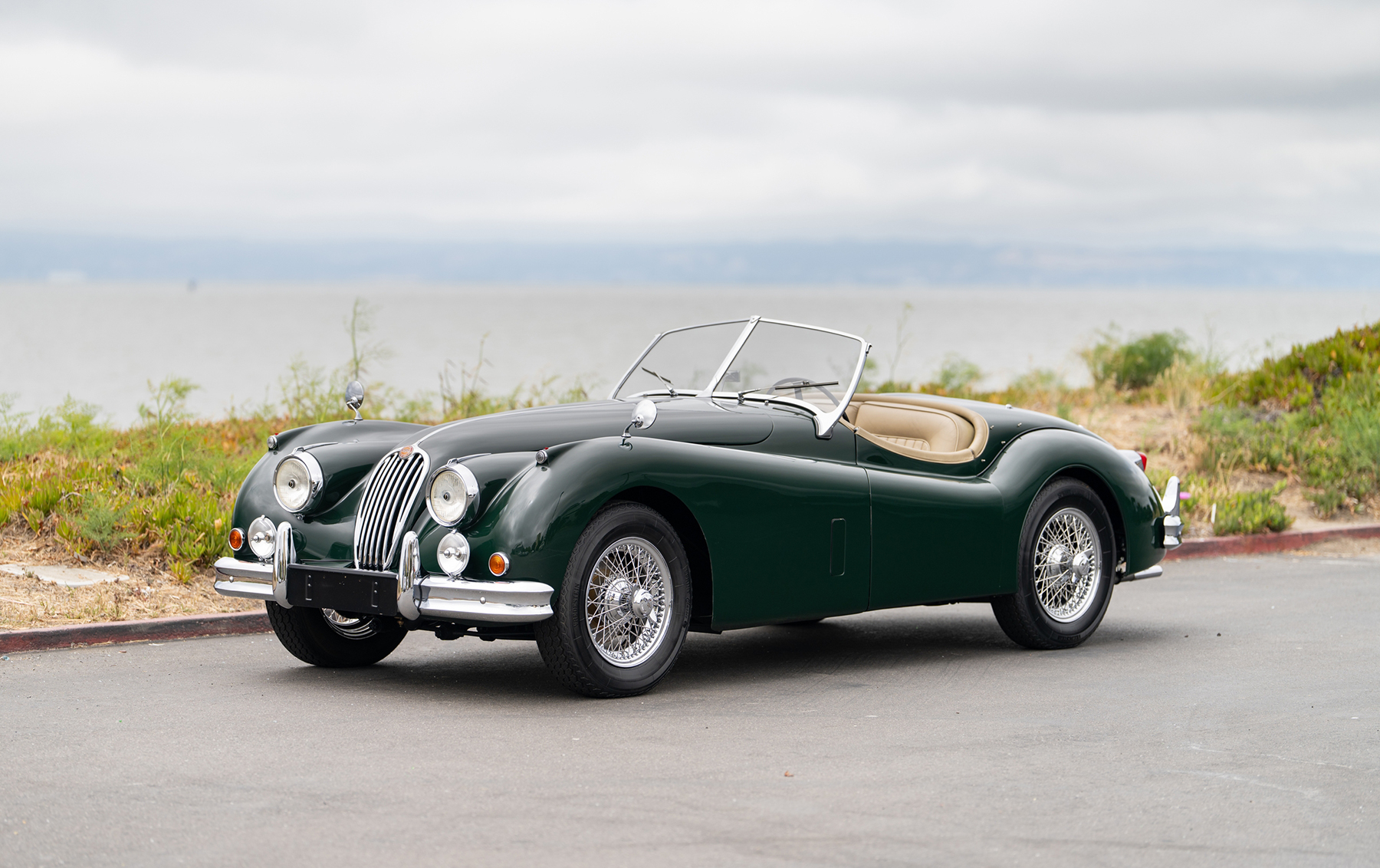 1956 Jaguar XK140 sold at auction for $100,800