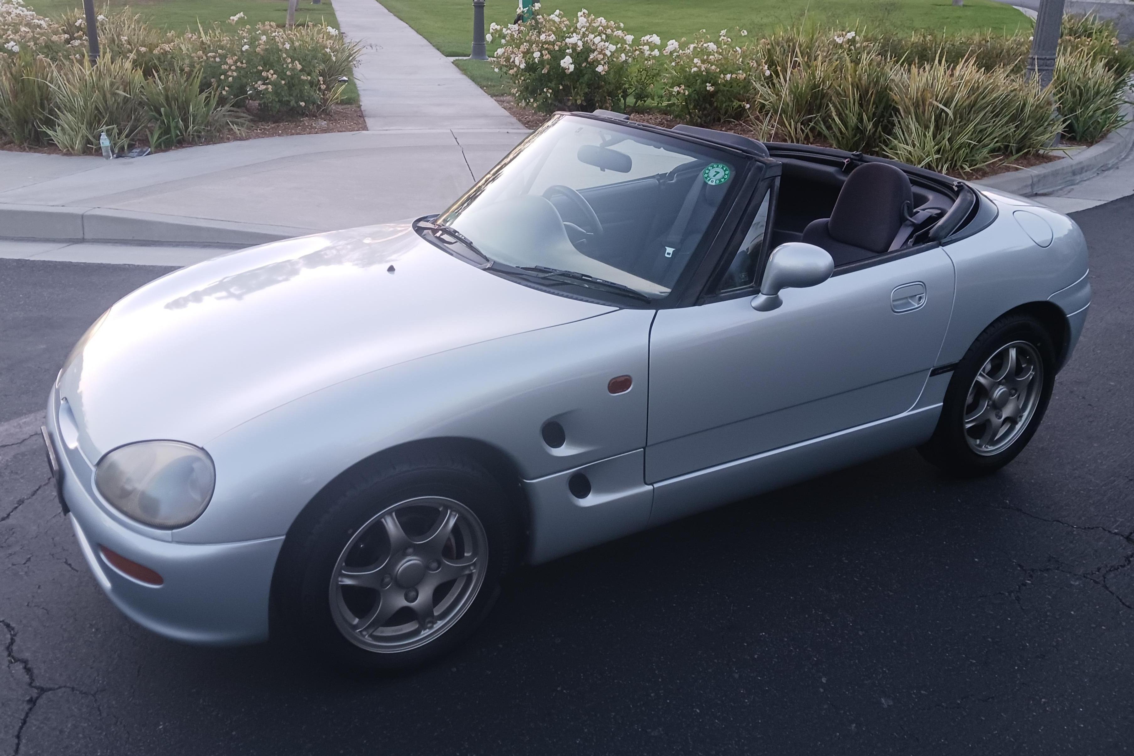 1996 Suzuki Cappuccino sold at auction for $7,977